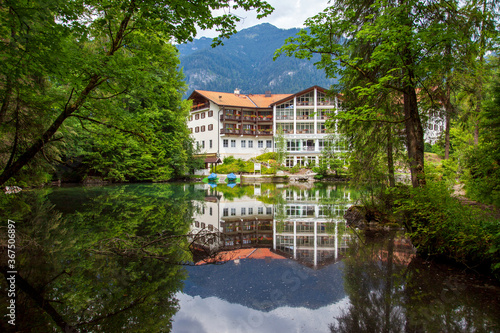 Hotel on Badersee (Lake Bader) with Mountain panorama, Ammergau Alps, Kramerspitz and Hoher Ziegspitz Mountain Peak. Bavarian alps village Grainau Bavaria Germany Grainau photo