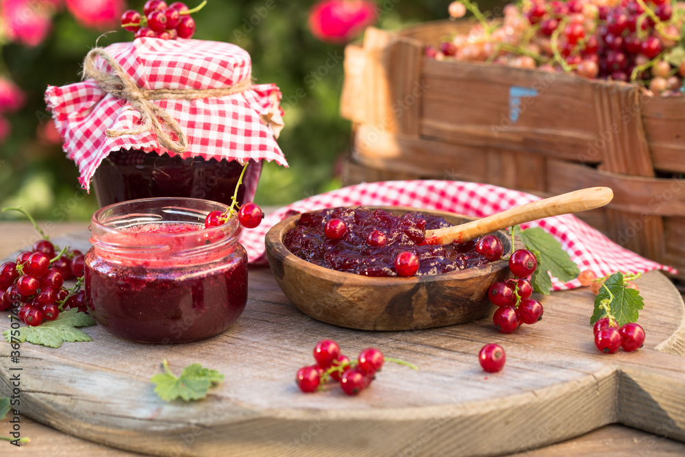 Homemade redcurrant jam. Fresh berries of currants. Concept cooking confiture Homemade redcurrant jam. Fresh berries of currants. Concept cooking confiture