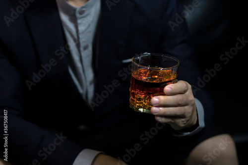 Wallpaper Mural Closeup businessmen holding a glass of whiskey Torontodigital.ca