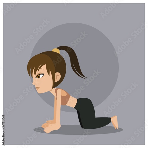 girl practising yoga in cat pose