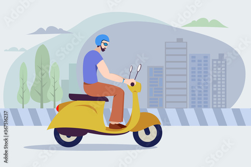 Young man rides a scooter in a city