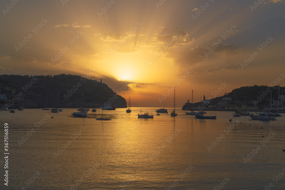 Spectacular view of a sunset at the touristic landmark Port de Soller (Serra de Tramuntana, Mallorca, Spain)