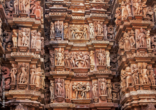 Sandstone artworks and sculptures of Khajuraho, India. Artifacts on the temple walls, from 10th century, ancient life.
