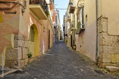 A narrow street between the old buildings of Venafro, a medieval village in the Molise region. © Giambattista