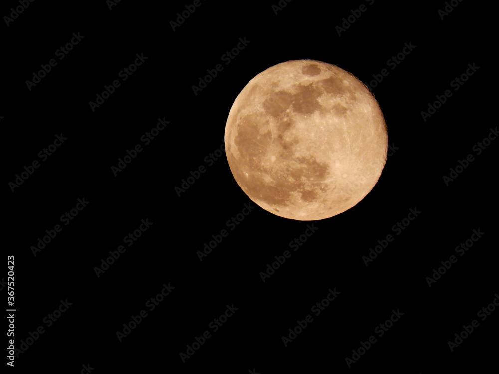 perfect bright full moon on dark sky over big city perfect bright full moon on dark sky over big city