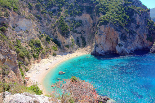 Best beach as seen from a higher angle with crystal clear azure water and empty beache in Corfu (Corfu, Greece, Europe)