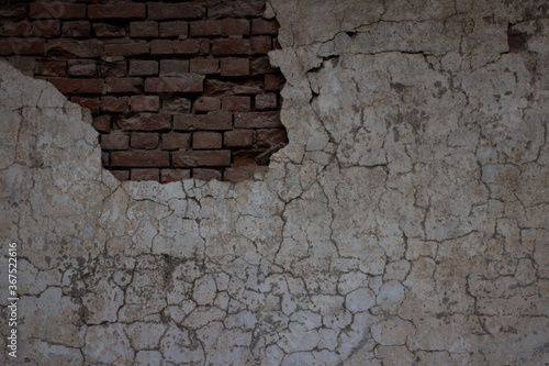 Old collapsed wall with plaster