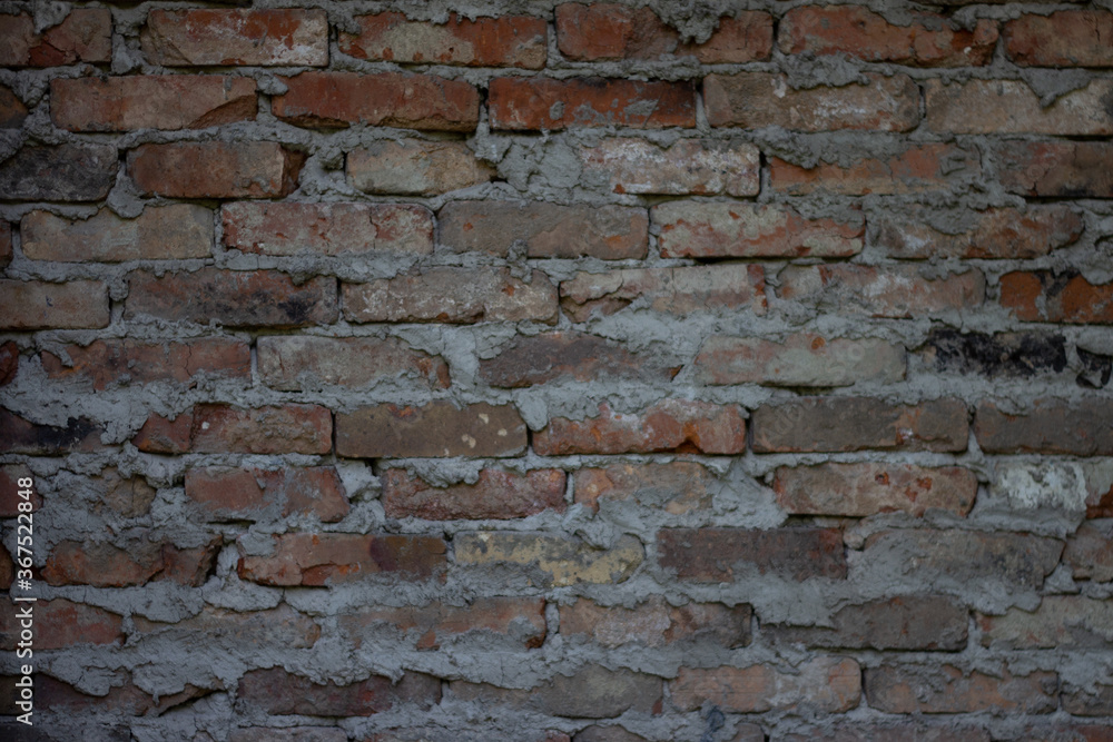 Obraz premium Old dirty red brick wall