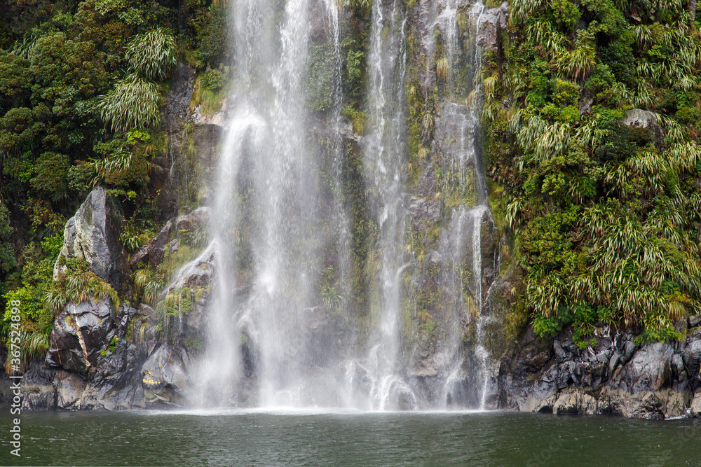 Water falls on Milford Sound - New Zealand. Fiordland National Park. Water falls on Milford Sound - New Zealand. Fiordland National Park.