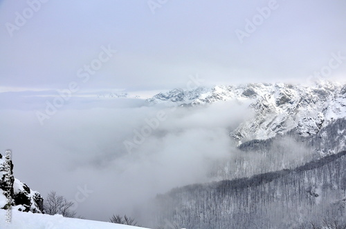 Rocks near Peak Botev, the highest peak of the Balkan Mountains and morning fog