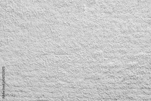 Abstract white background. Rough irregularities in the plaster. Wall surface.