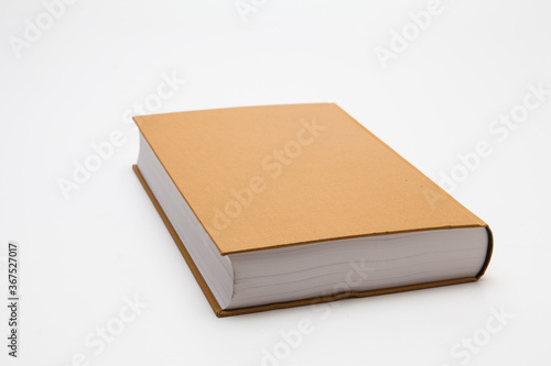 Gold color blank book on white background 