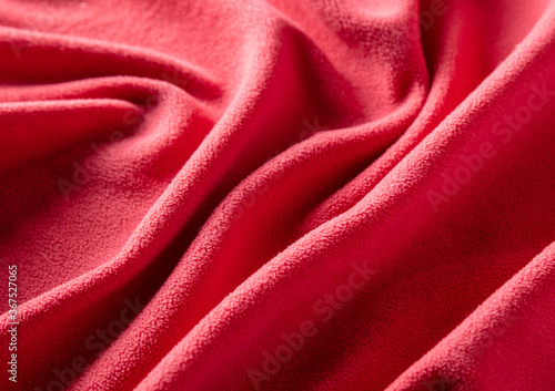 Red factory fabric as an abstract background.