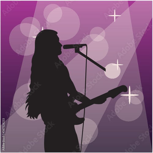 silhouette of a singer with a guitar