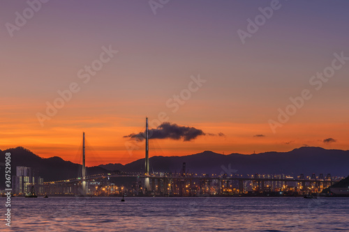 Photography Panorama landscape of harbor and bridge of Hong Kong city under sunset