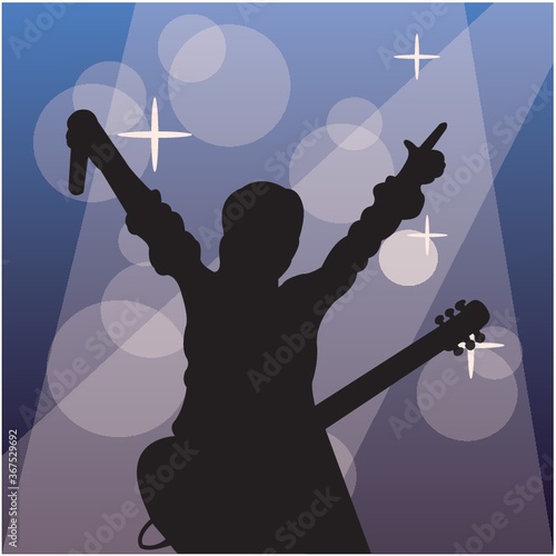 silhouette of a singer with a guitar