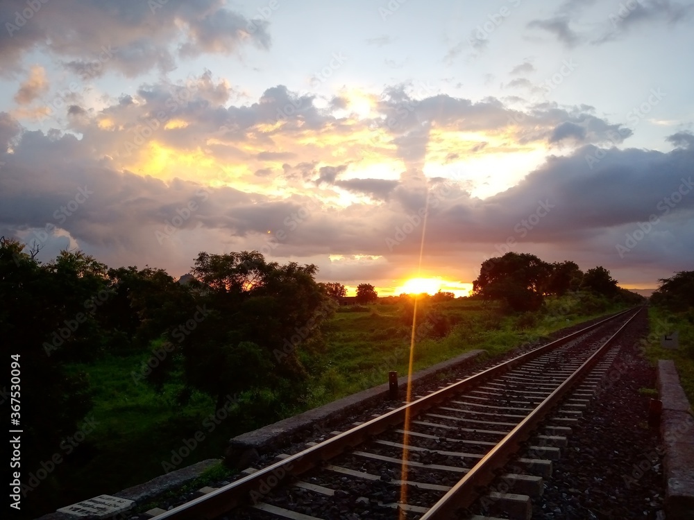 Fototapeta premium railway in the sunset