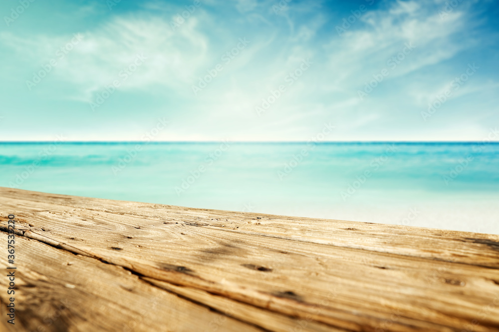 Wooden desk of free space and summer ocean landscape 