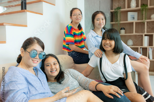 Photography asian woman and teenager smiling with happiness in home living room