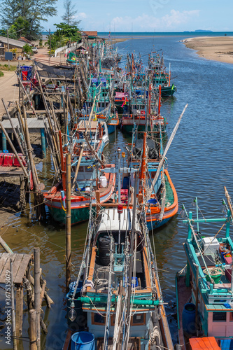 Fisherman boat in fishing port, Thailand. The mouth of the river into the Thai sea 