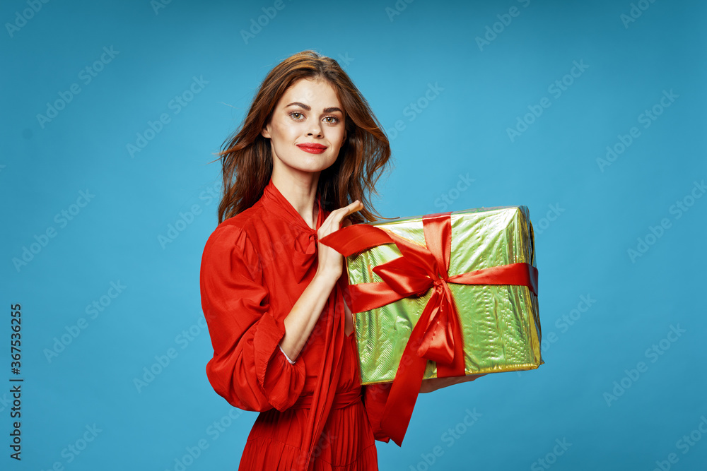 Gift in woman hands Christmas holiday fun Red robe Gift in woman hands Christmas holiday fun Red robe