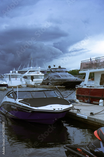 yachts in the seaport on a cloudy day