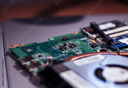 Computer circuit board. Computer repair shop. High technology. Motherboard. Laptop motherboard. Cooler