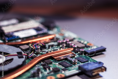 Computer circuit board. Computer repair shop. High technology. Motherboard. Laptop motherboard. Cooler