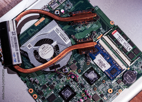 Computer circuit board. Computer repair shop. High technology. Motherboard. Laptop motherboard. Cooler