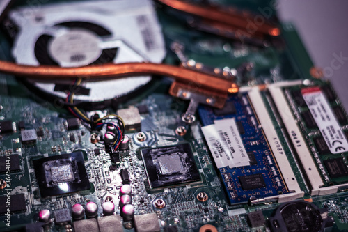 Computer circuit board. Computer repair shop. High technology. Motherboard. Laptop motherboard. Cooler