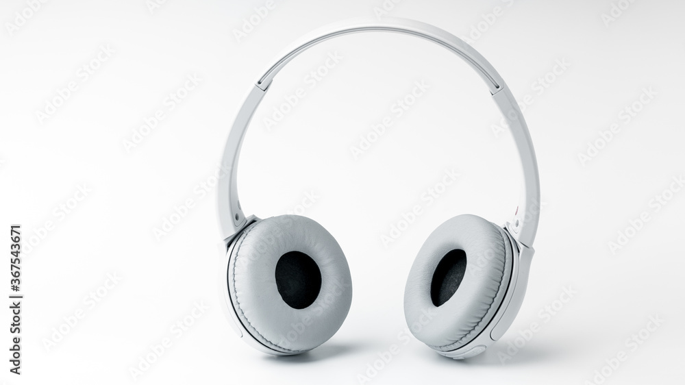White Wireless Headphone on isolated white background. Entertainment Accessory White Wireless Headphone on isolated white background. Entertainment Accessory