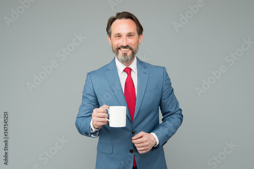 Office worker man formal suit drink coffee, breakfast time concept