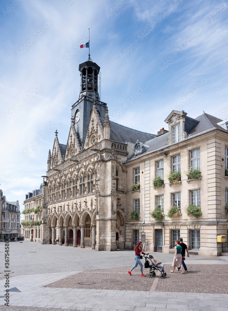Obraz premium locals in front of town hall in french town of saint-quentin