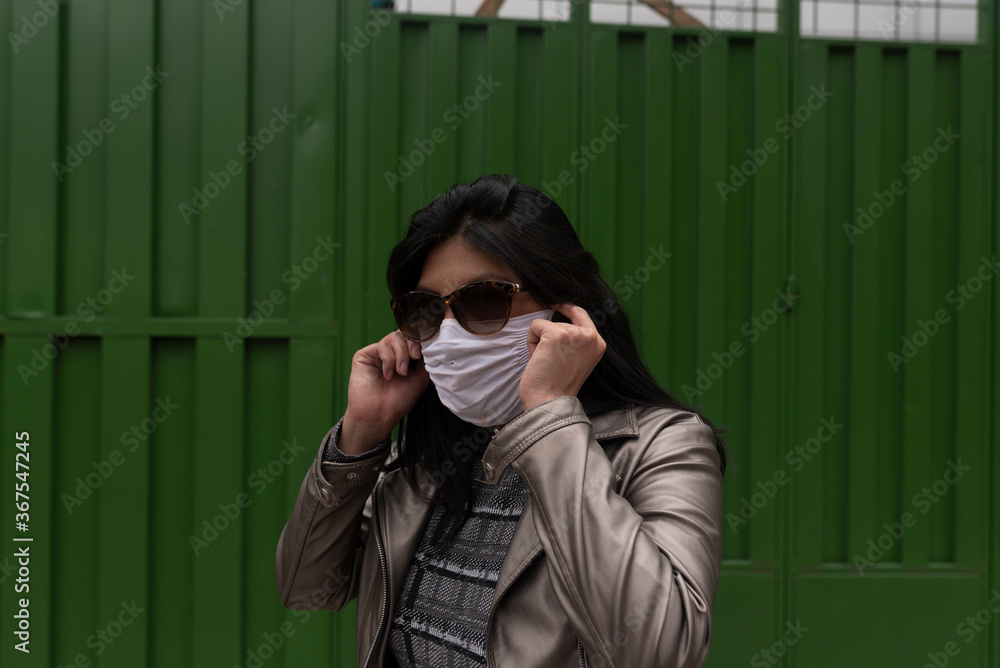 A female wearing a face mask
