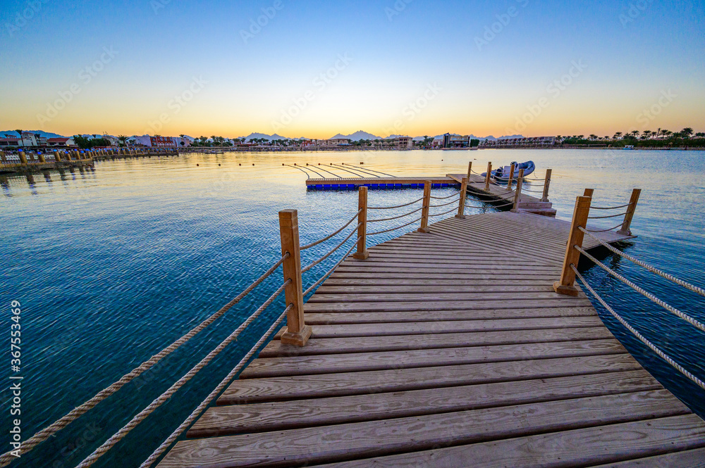 Wooden Pier on Red Sea in Hurghada at sunset, Egypt - travel destination in Africa