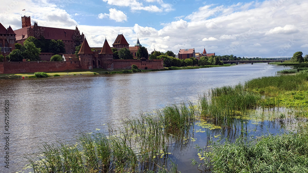 Obraz premium Castle in Malbork on the Nogat River, Poland