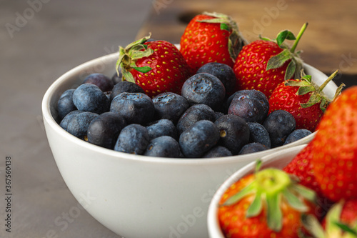 Close up photo of blueberries and strawberries