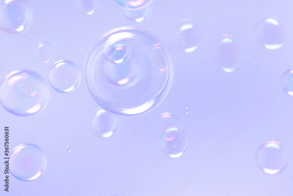 transparent soap bubbles float background.