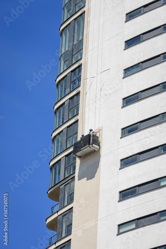 Outside maintenance on a tower block 