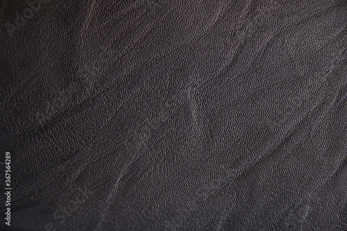black leather texture seamless. High-resolution texture of folds. black calf leather