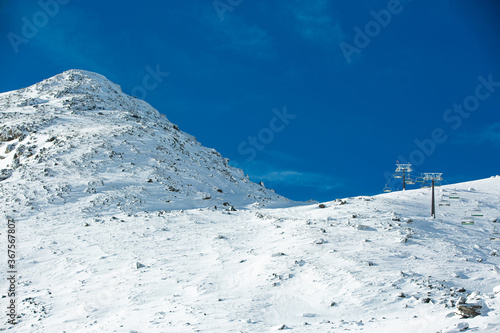 Winter landscape of snow mountain against blue sky in South island, New Zealand. © tonklafoto
