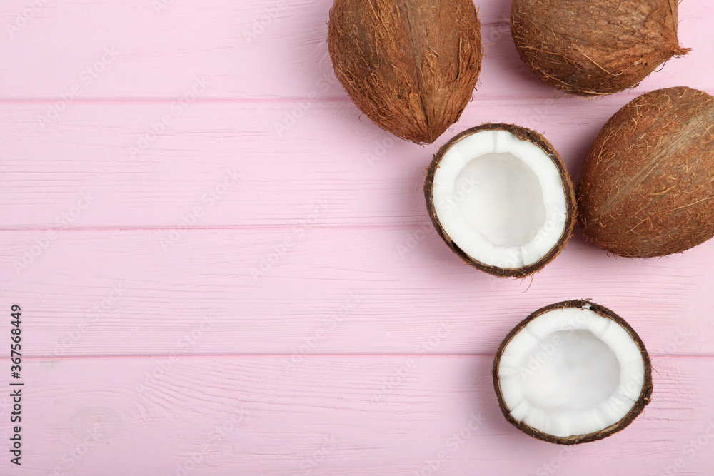 broken coconut on a colored background.
broken coconut on a colored background.