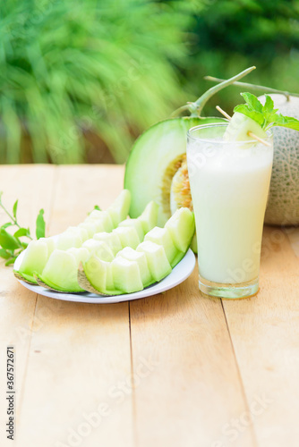 Milk melon Smoothie in glass with fresh melon