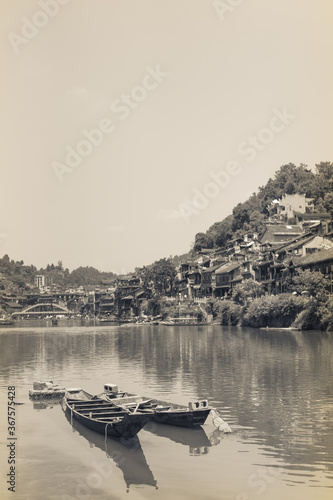 Old wooden boats in Fenghuang photo