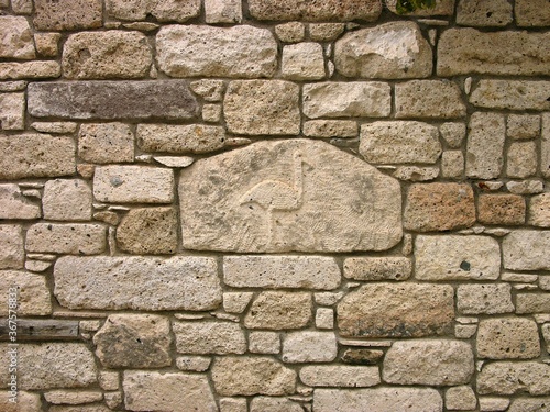 Old stone wall texture in Alacati, Izmir, Turkey photo