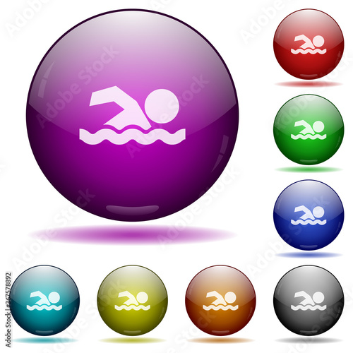 Swimming man icon in glass sphere buttons