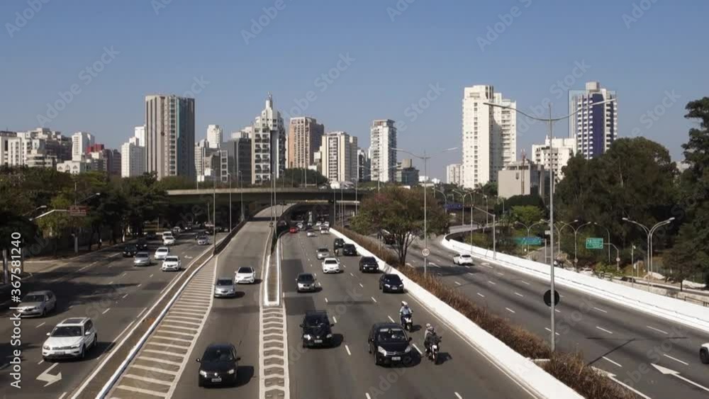 traffic on large freeway '23 de Maio Avenue' and skyscrapers cityscape, in Sao Paulo, Brazil traffic on large freeway '23 de Maio Avenue' and skyscrapers cityscape, in Sao Paulo, Brazil