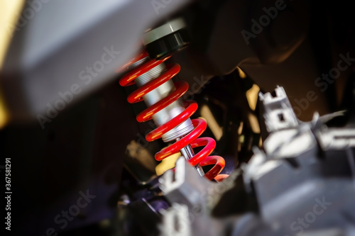 Schilderij op canvas Off road car with red shock absorber