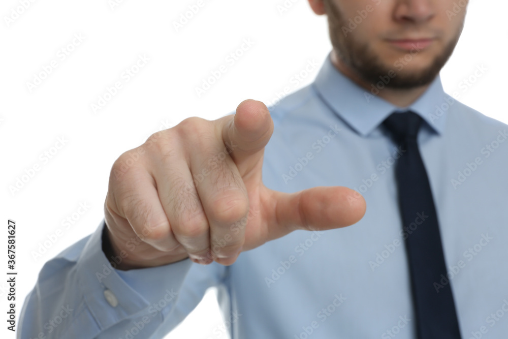 Businessman touching something against white background, focus on hand Businessman touching something against white background, focus on hand