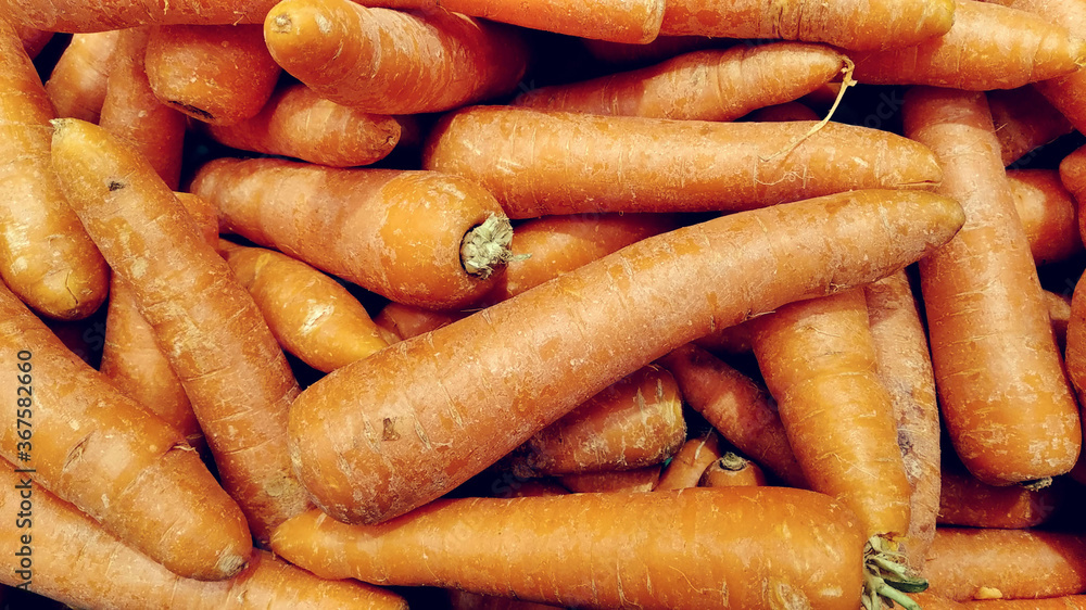 natural group of carrots closeup texture in a healthy market for a background wallpaper natural group of carrots closeup texture in a healthy market for a background wallpaper